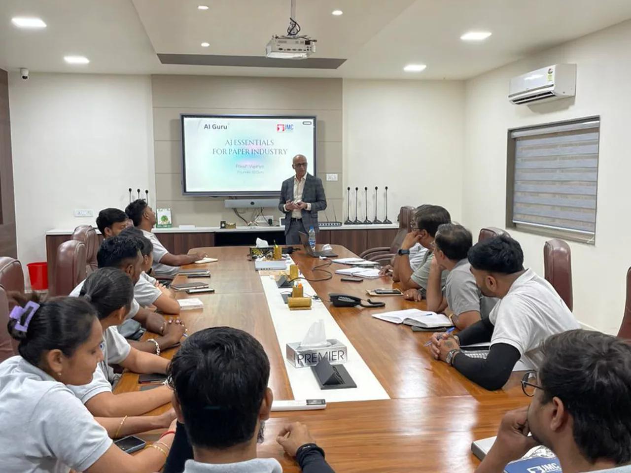 Ritesh Vajariya running a corporate AI workshop for the paper-industry leadership team in Ahmedabad, India