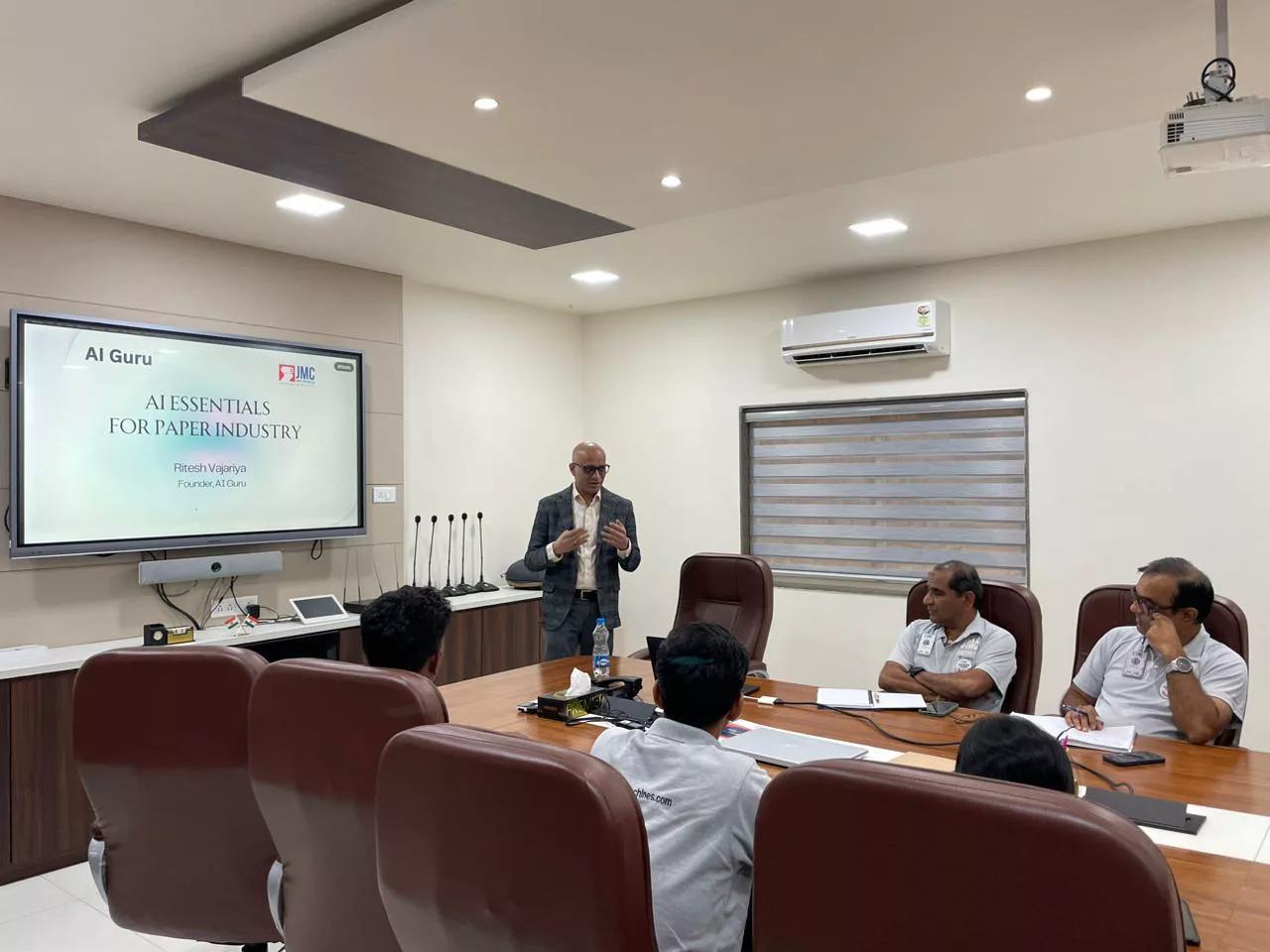 Wider boardroom view of the AI Guru workshop for paper industry client in Ahmedabad